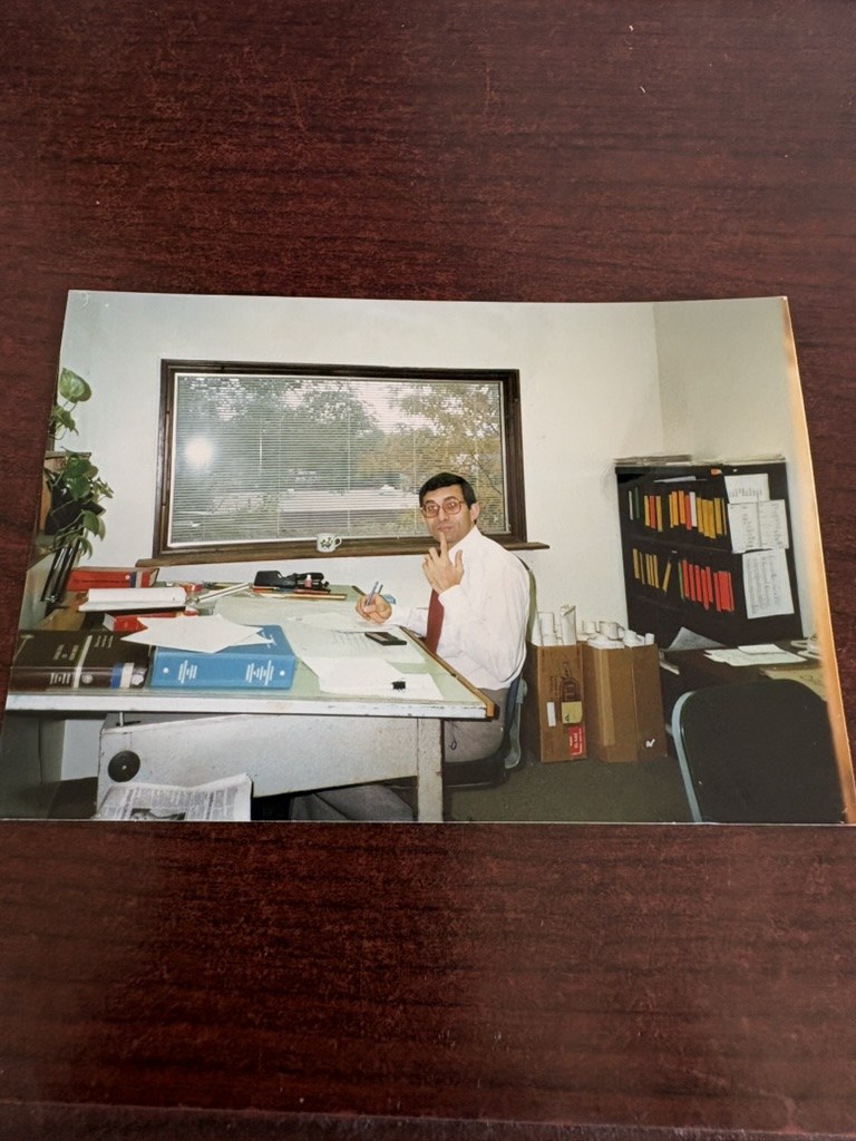 Younus Samadzada seated at an engineering desk